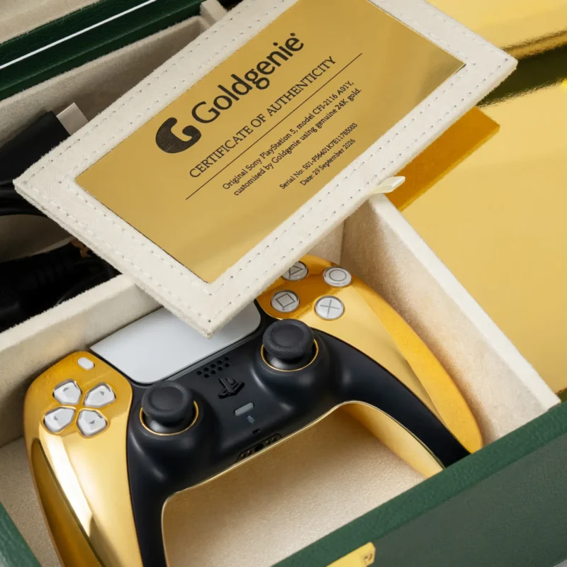 Close-up of gold plated controller and Goldgenie certificate of authenticity